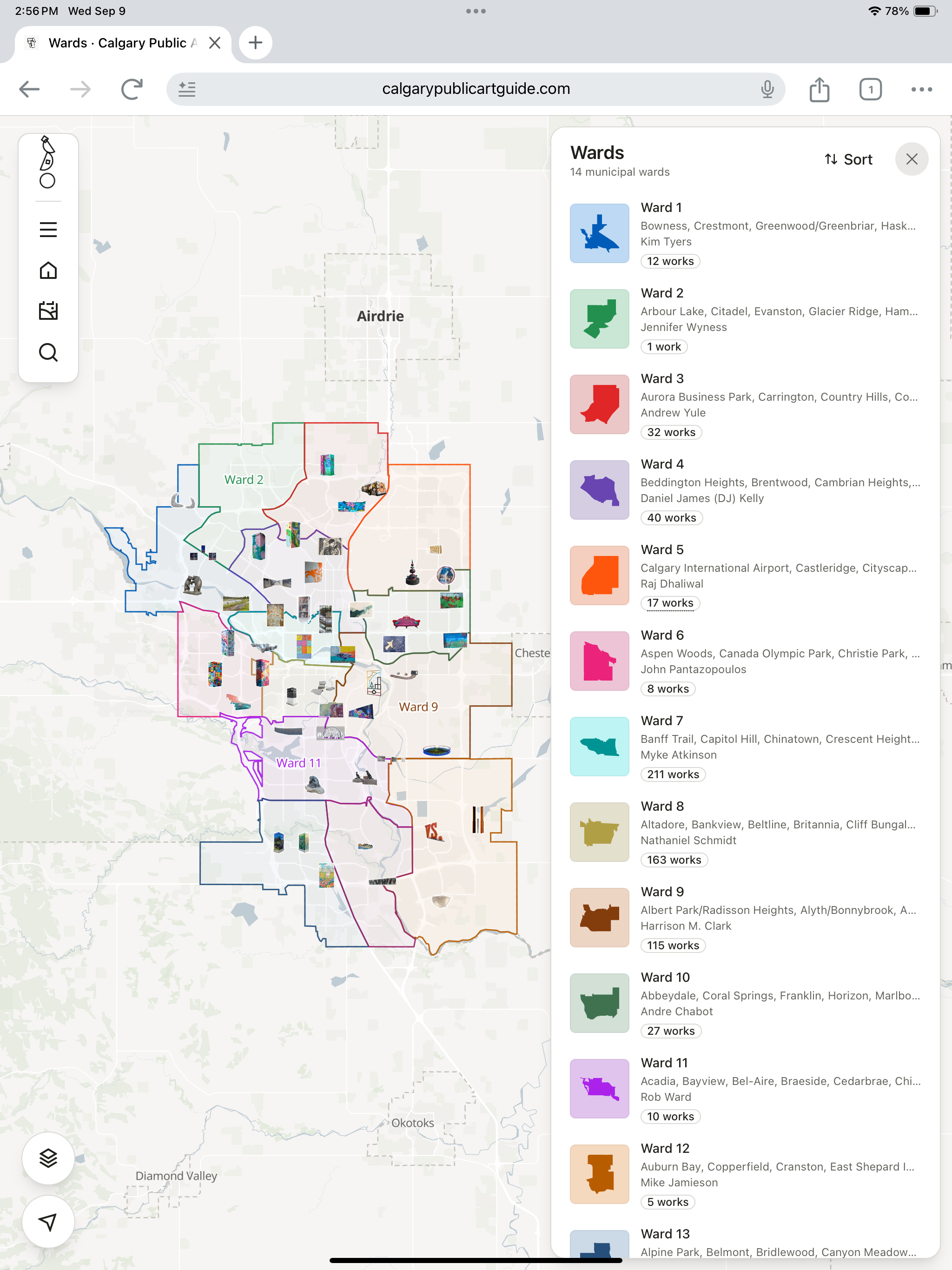 Calgary Public Art Guide on a tablet, showing the city's wards on the map beside a list of wards with their neighbourhoods and artwork counts.