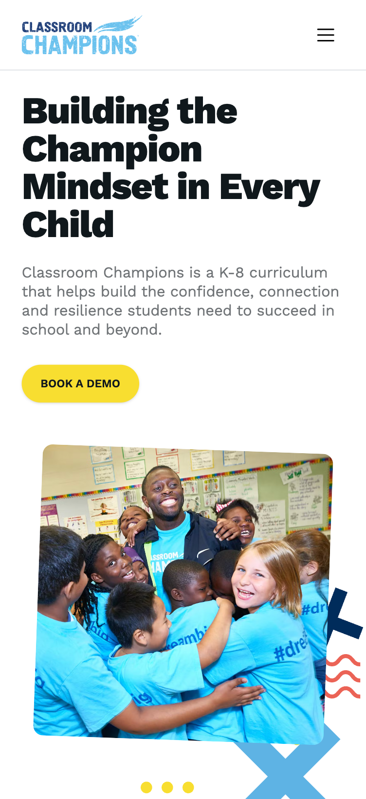 Classroom Champions mobile homepage headlined 'Building the Champion Mindset in Every Child,' with a 'Book a Demo' button and a photo of a teacher hugging students.
