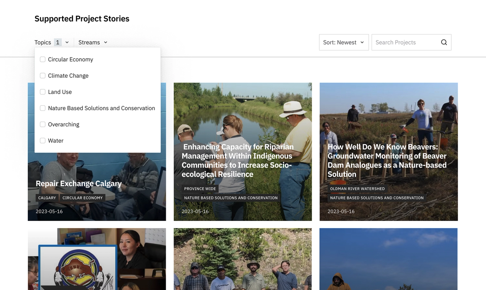 Alberta Ecotrust's Supported Project Stories index with the topic filter open, listing circular economy, climate change, land use, nature-based solutions, overarching and water.