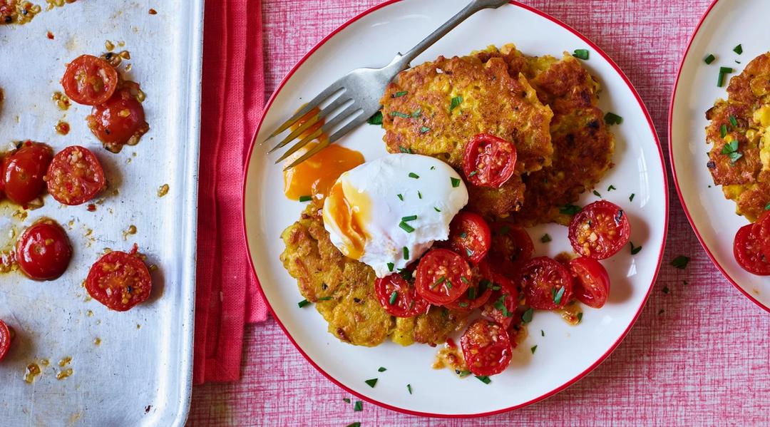 Corn cakes with poached eggs & spicy roast tomatoes LEON