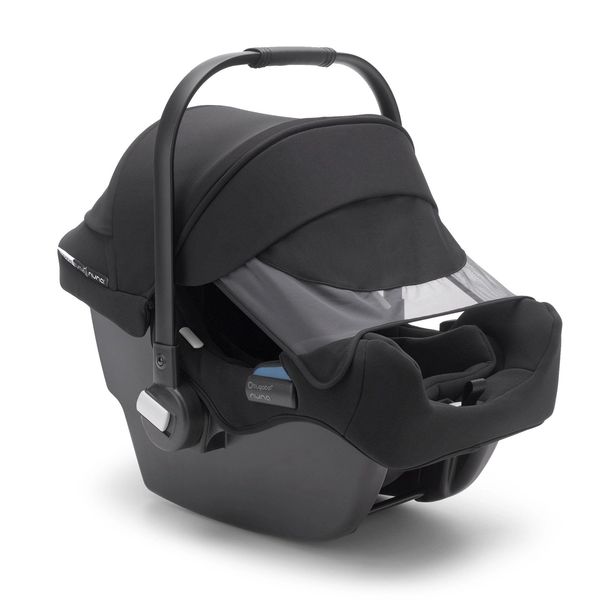 Bugaboo Turtle by Nuna bilstol med väderskydd monterat