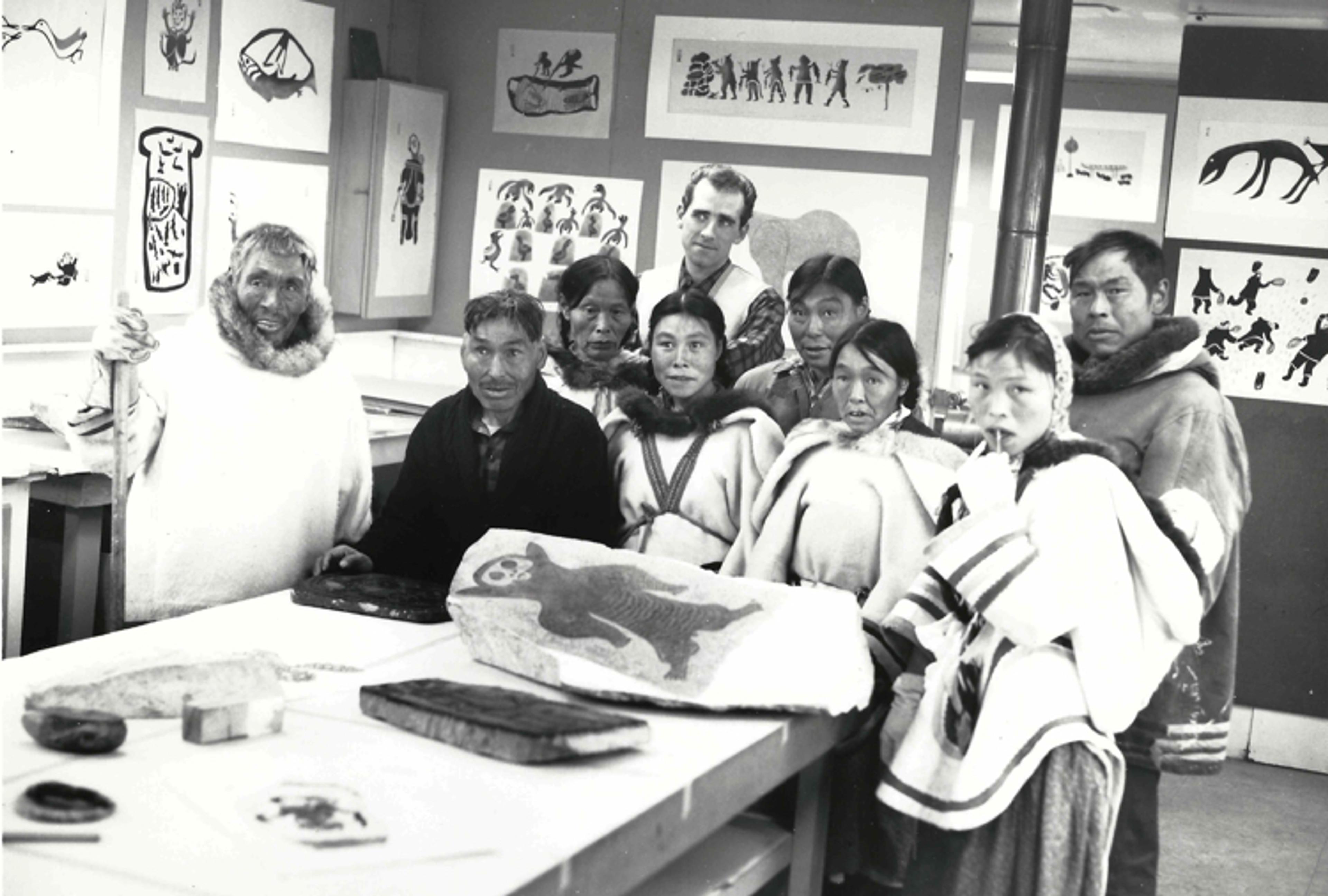 Artists at the print studio in Cape Dorset, including Ashevak (centre).