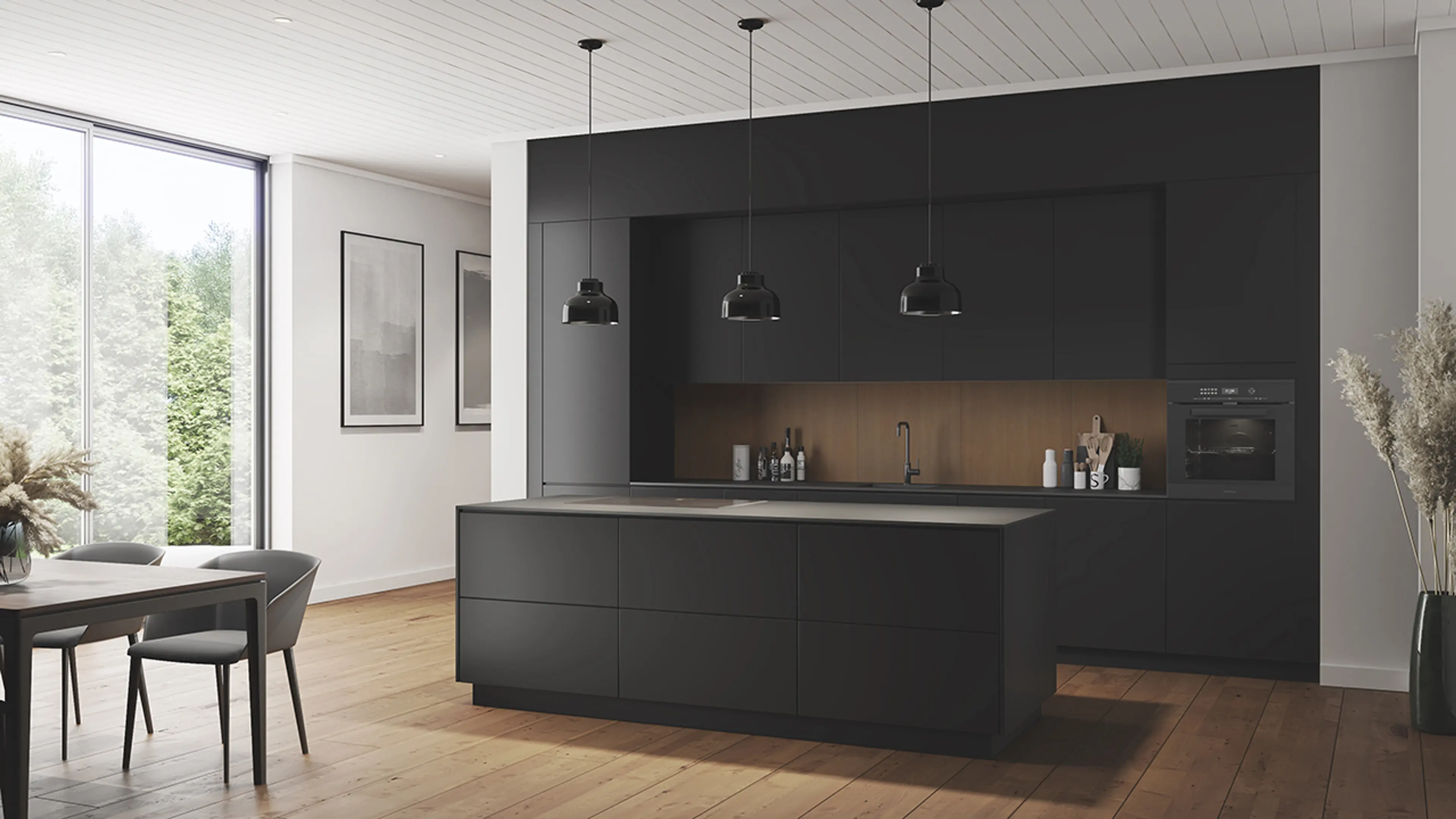 Nytt kjøkken med svart kjøkkeninnredning og kjøkkenplater i eik over kjøkkenbenken.