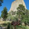 Devil's Tower is not its only name. Some Native American tribes call it something to the effect of "Bear's Lodge", named for the bear that, in various legends, tried to climb the rock.