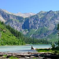 Avalanche Lake is beautiful! We learned that the crisp blue of glacial lakes comes thanks to glacial rock flour! Glaciers grind up the rocks they cover and the fine dust gives the water a milky cast.