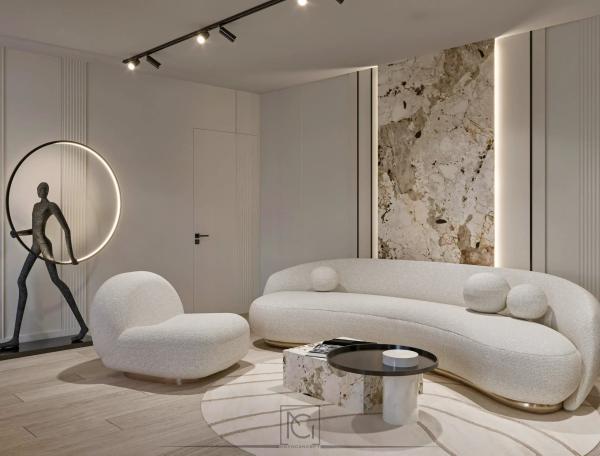 Randare 3D de living cu canapea curbată albă, perete din piatră naturală și spoturi pe șină – Apartament J.S., București