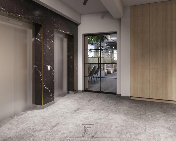 Randare de hol de lift cu marmură neagră și ușă din sticlă cu profile negre spre bar
