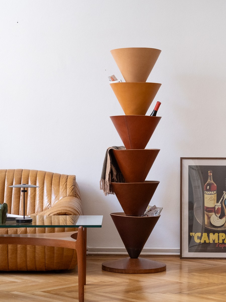 House Palm by NOEMAR — a stylised palm-tree shelf of stacked leather cones, referencing the Palmenhaus at Schönbrunn.