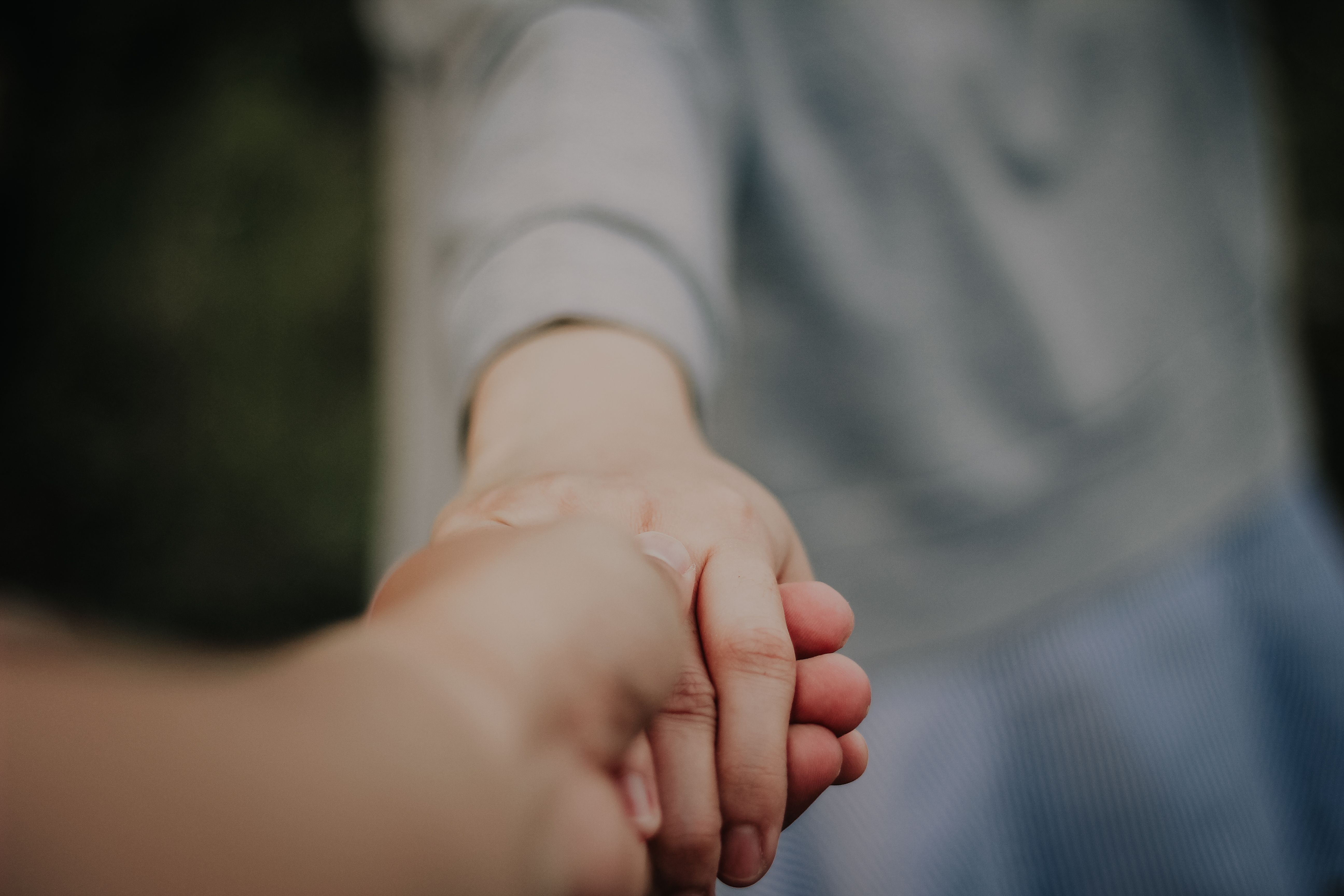 Couple holding hands