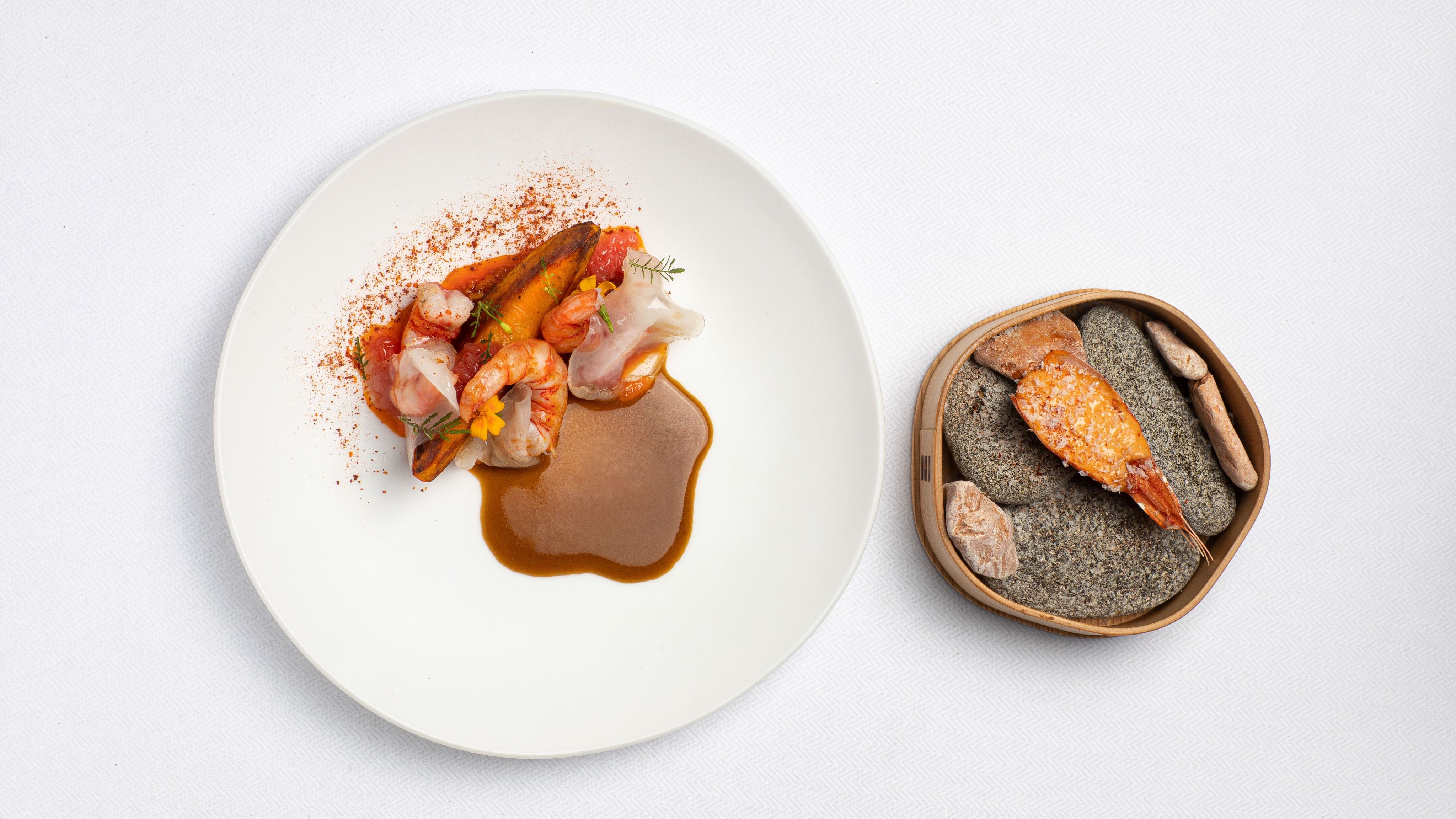 Entrée langoustines servie au restaurant Les Ombres