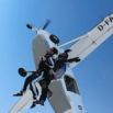 Saut en tandem sortant d'un avion de parachutisme