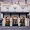 Façade de l'Hôtel Napoléon au crépuscule