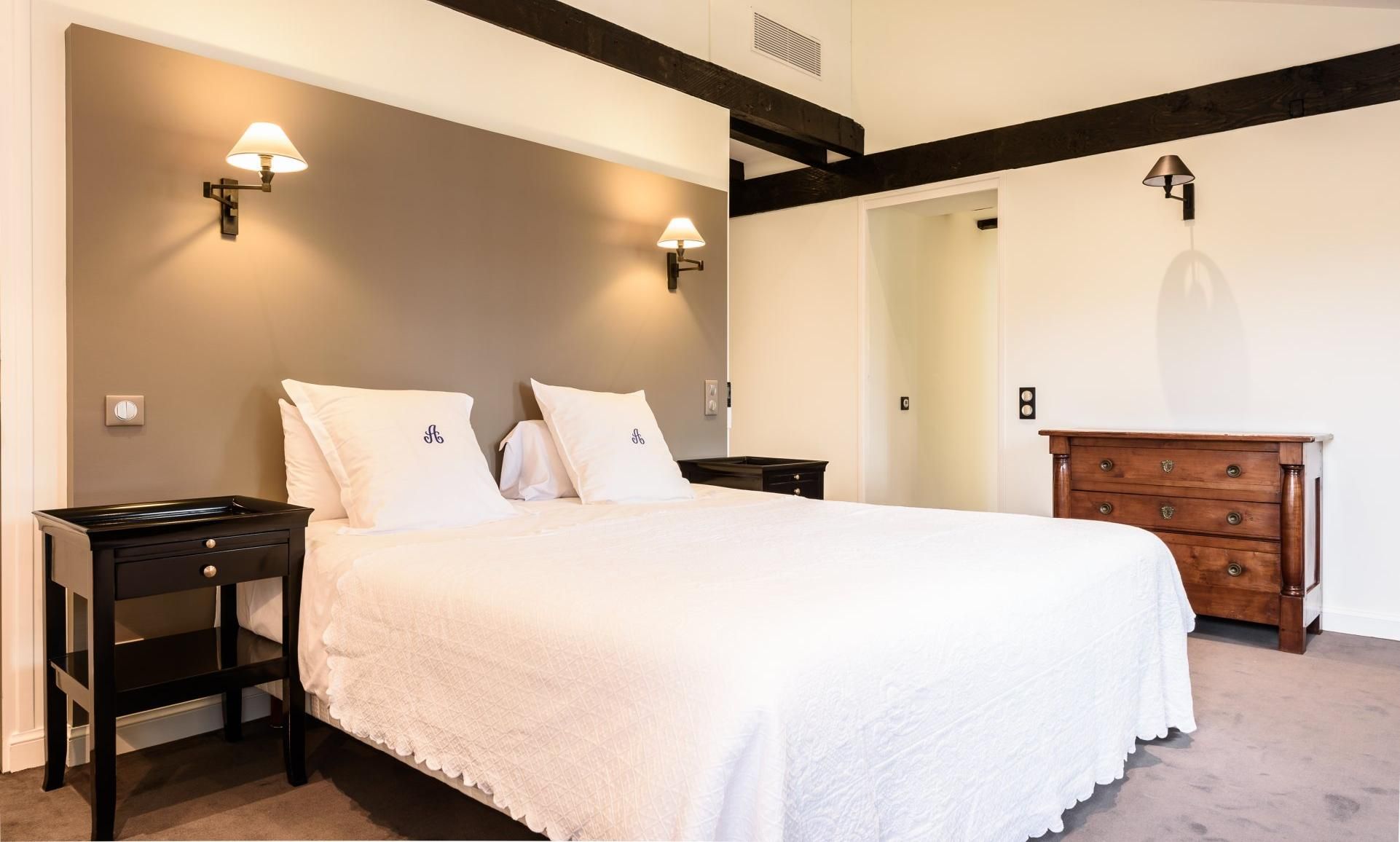 Chambre double creme poutres