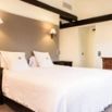 Chambre double creme poutres