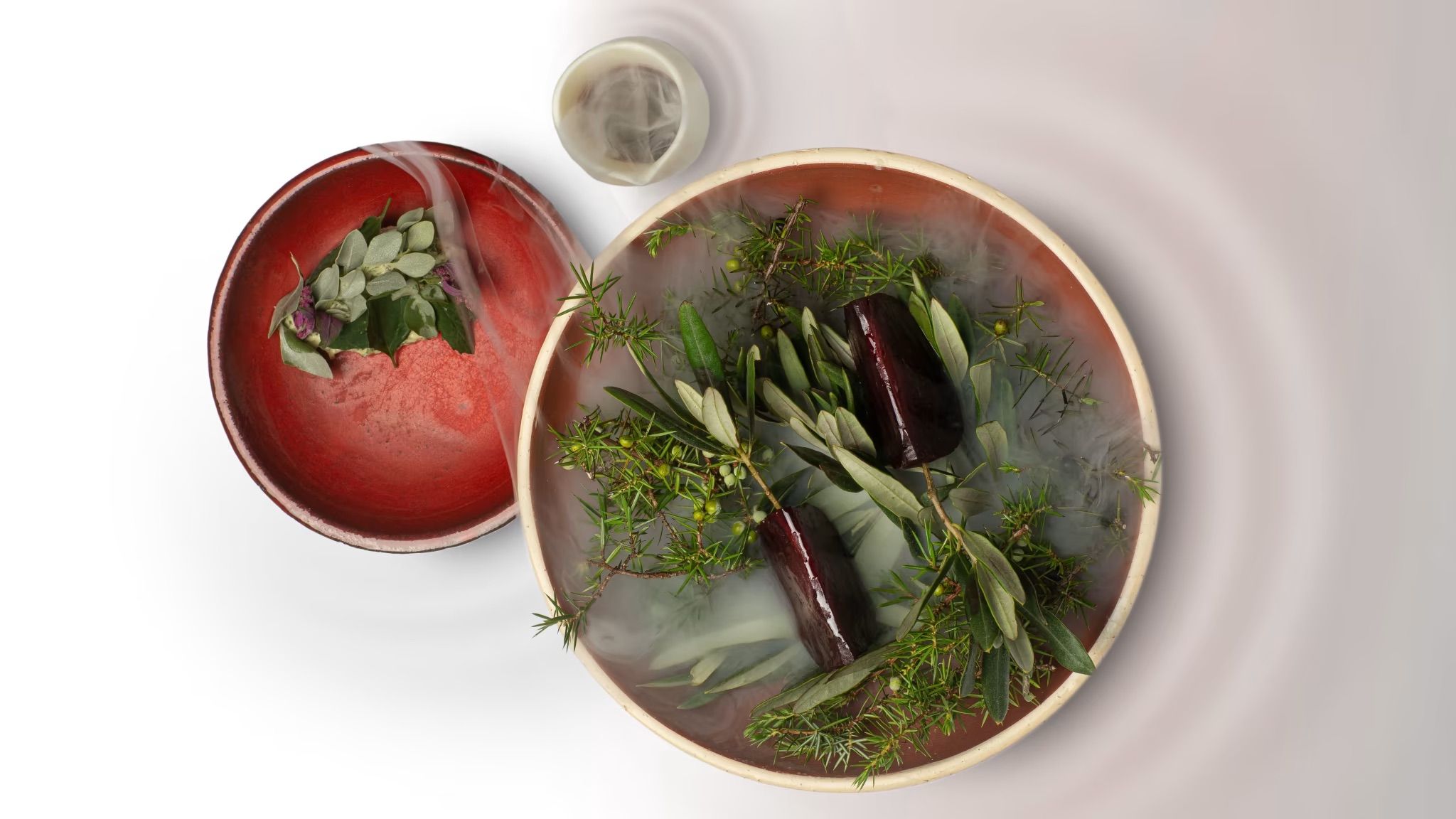 Mise en scène gastronomique sous fumée au restaurant Les Ombres