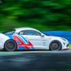 Alpine A110 en pleine accélération sur circuit