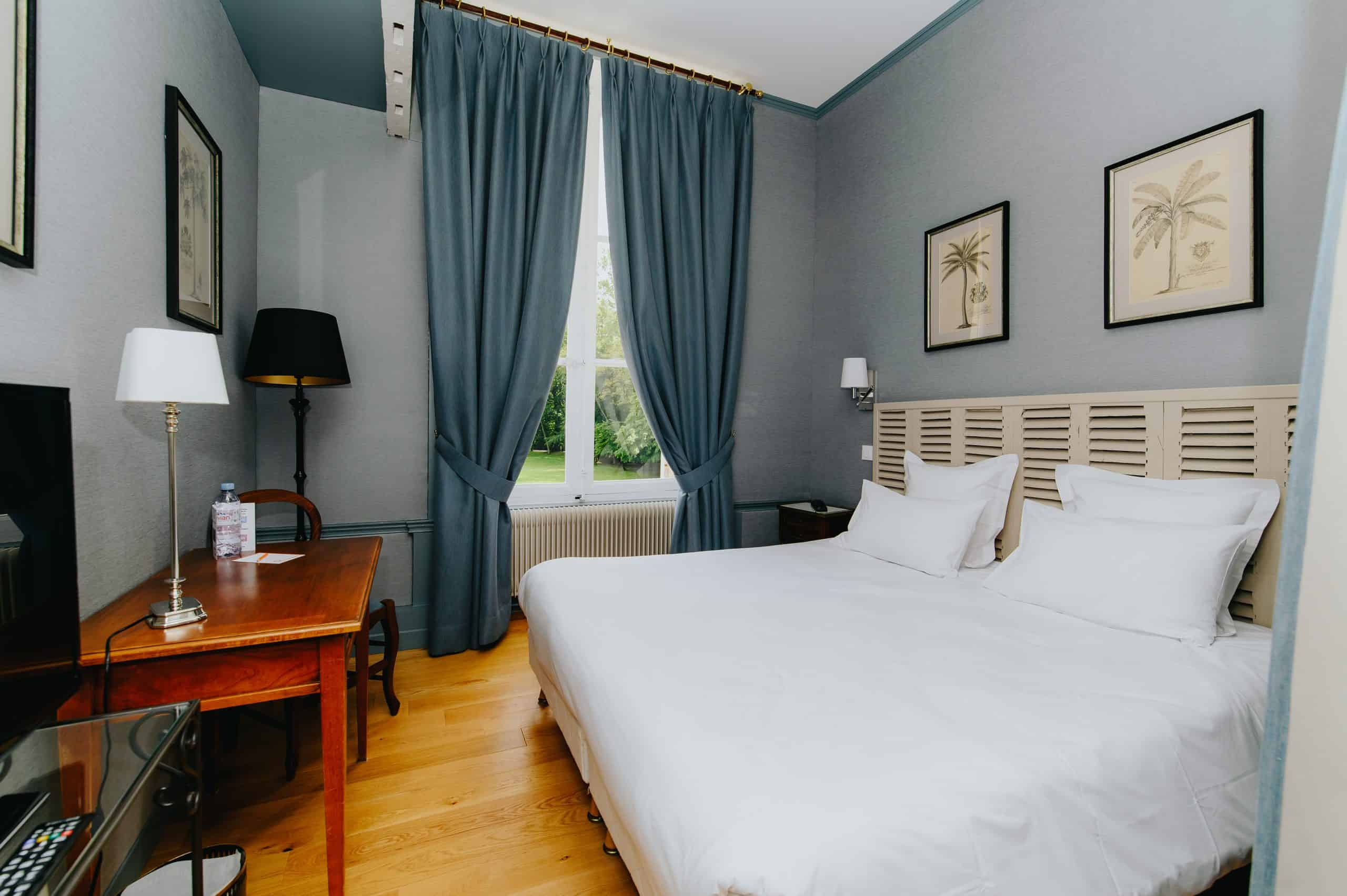 Chambre bleu palmiers
