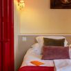 Chambre double rouge tete lit