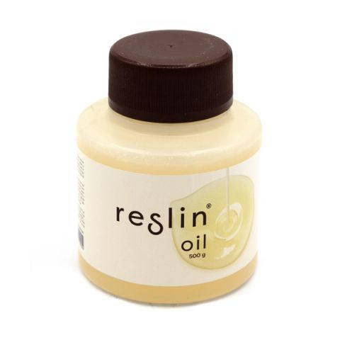 A squat plastic tub of pale yellow resin with a dark brown screw lid, labelled “reslin oil, 500 g” beside a small leaf-and-droplet illustration.