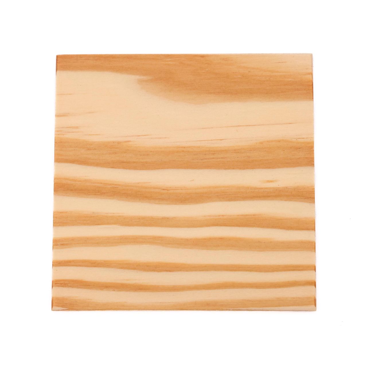 A square of yellow pine in pale honey, its grain running in broad wavy bands of cream and warm tan.