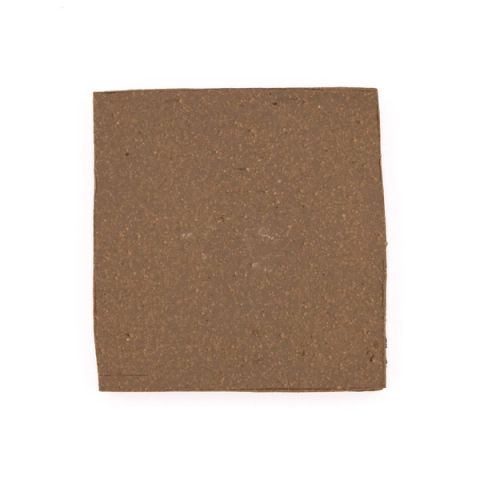 A square fired slab in warm mid-brown, its surface finely grainy and flecked with darker specks.
