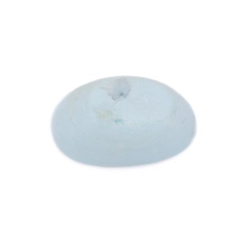 A small oval of pale blue-white foam, its surface smooth and slightly domed with a faint grey smudge.