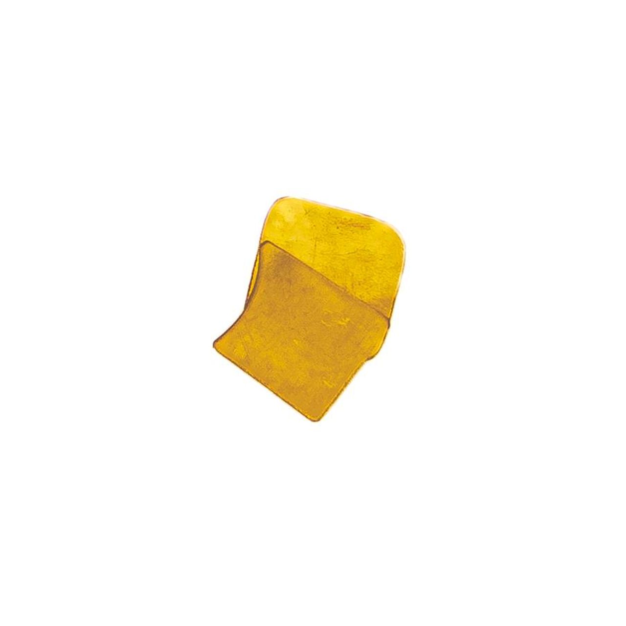 A small irregular sheet of brass in bright yellow-gold, its surface faintly mottled where the light catches, one edge curling upward.