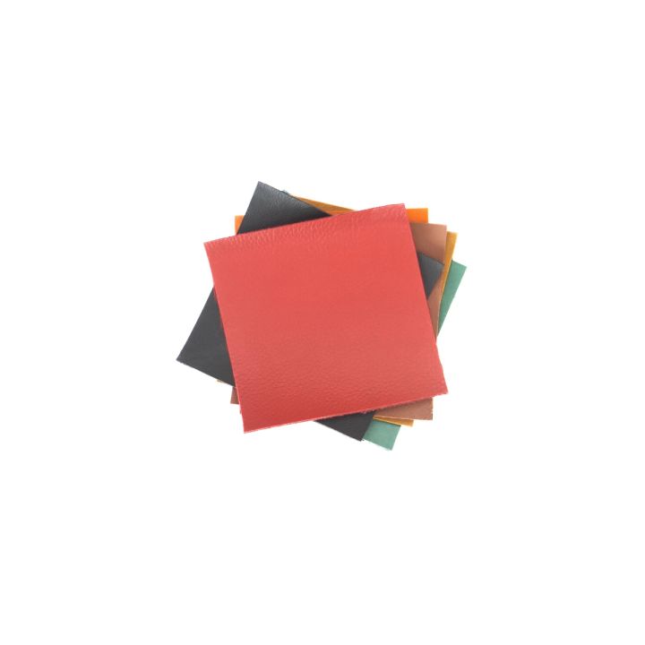 The five squares stacked and rotated into a loose pinwheel, red uppermost with green, black and ochre edges fanning out beneath.
