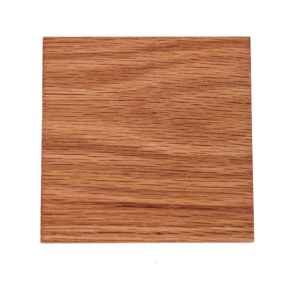 A square of red oak in warm reddish tan, its grain running in fine straight horizontal lines flecked with darker markings.