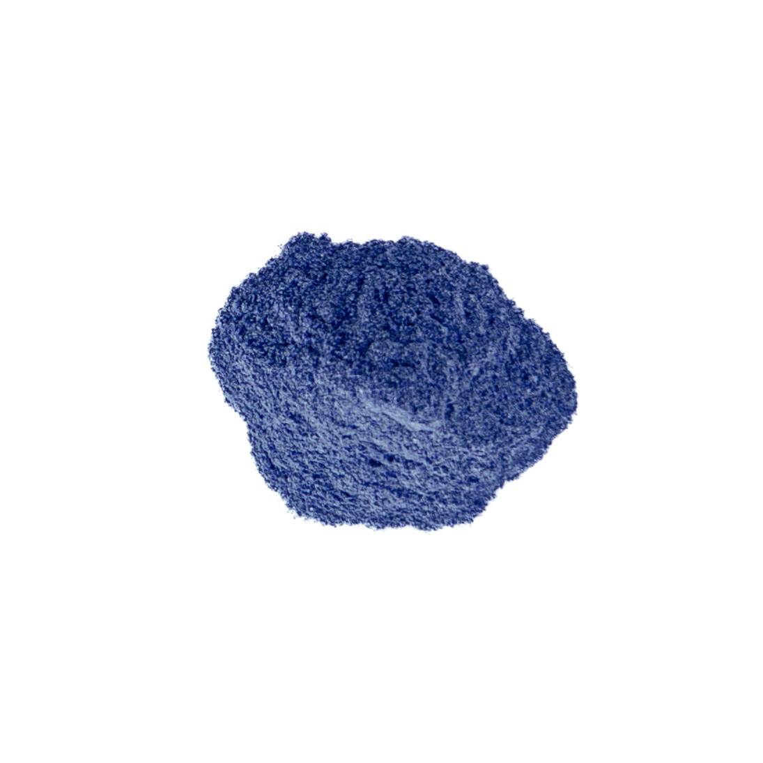 A small mound of powdered enamel in deep cobalt blue, finely granular and softly domed.