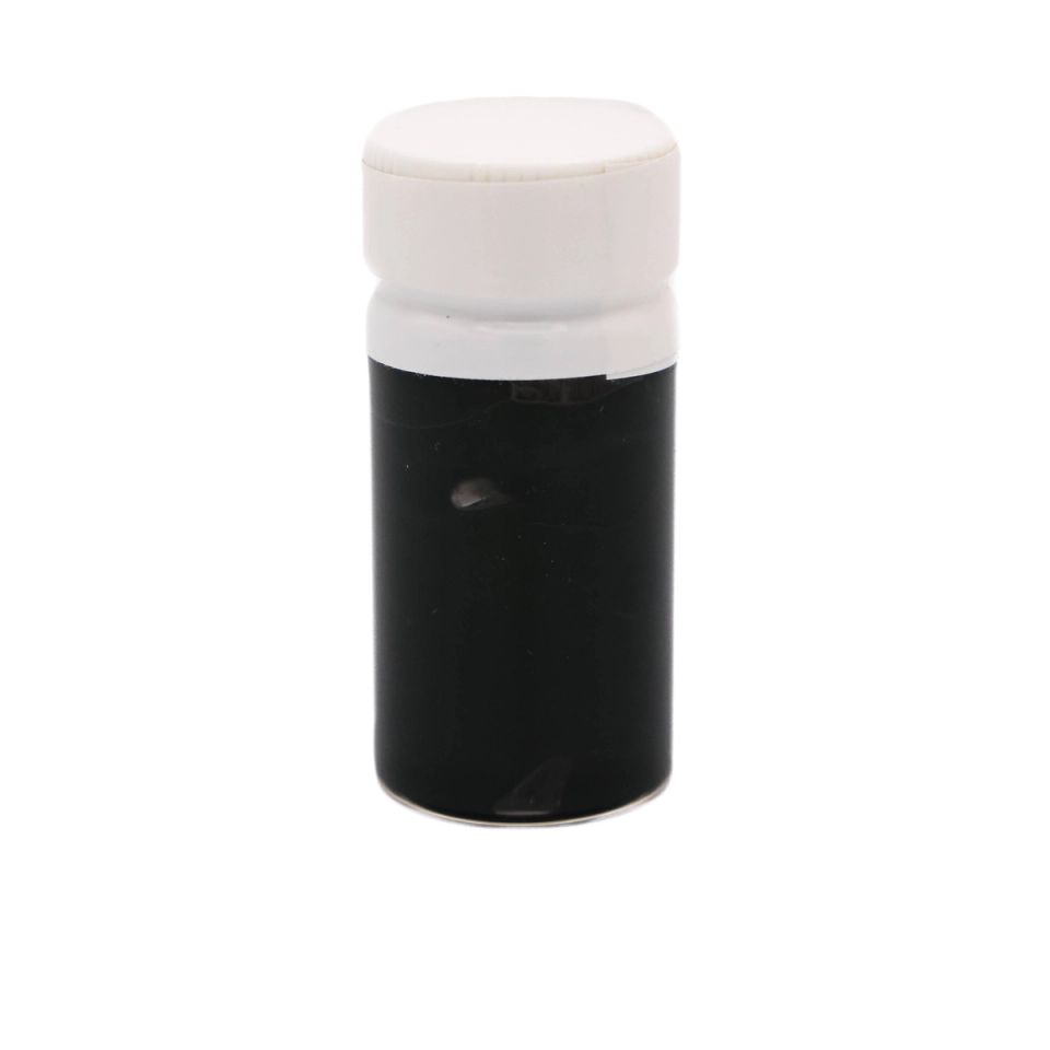 A small clear vial with a white screw cap, filled to the shoulder with opaque black ink.