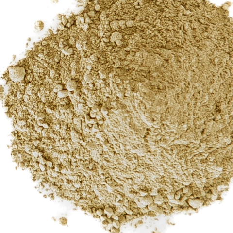 A wide heap of dry clay powder in olive-khaki, coarsely granular with paler lumps breaking the surface.