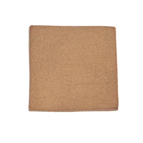 A square fired slab in warm terracotta brown, its surface finely grainy with faint tooling marks near the edges.