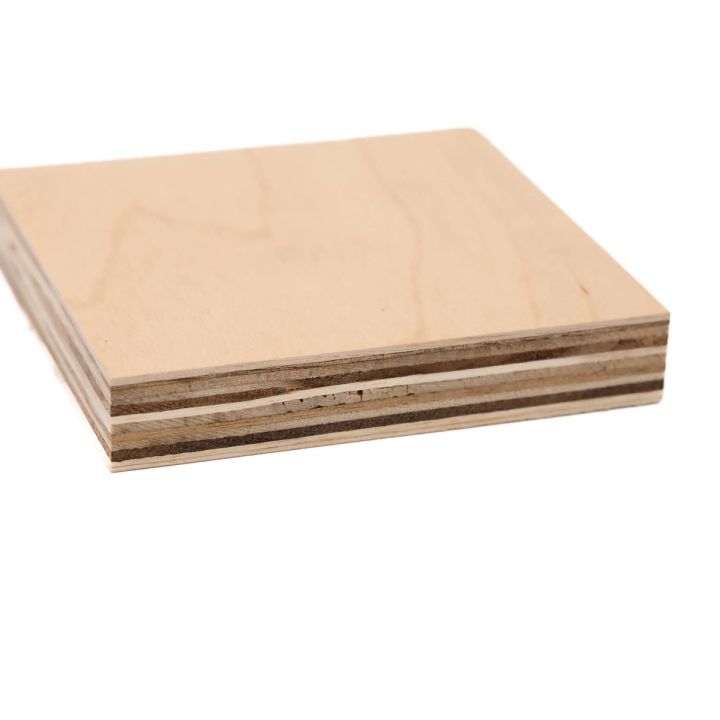 The same panel seen at an angle from the edge, its alternating light and dark plies stacked in visible layers.