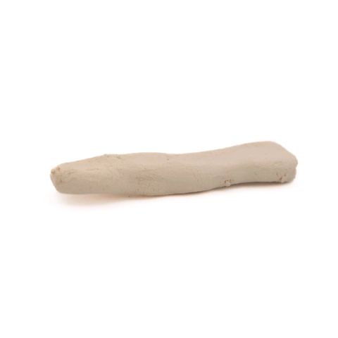 A rolled coil of pale grey-cream clay lying horizontally, its surface smooth with soft finger marks along its length.