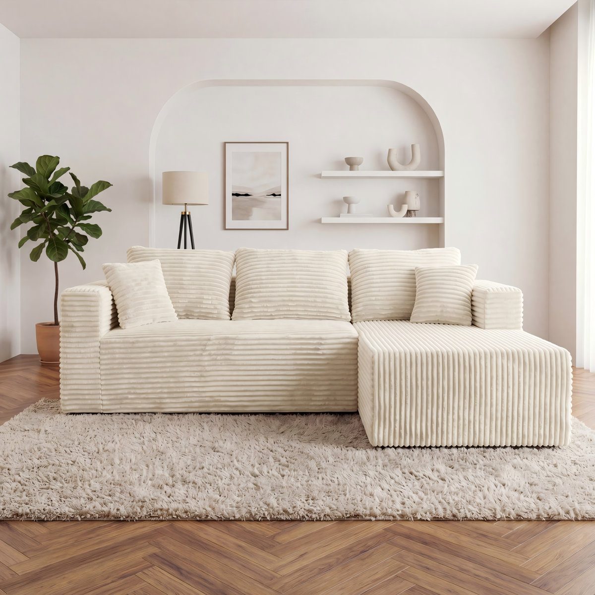 The L compressed sofa with its single projecting chaise in Cream White.