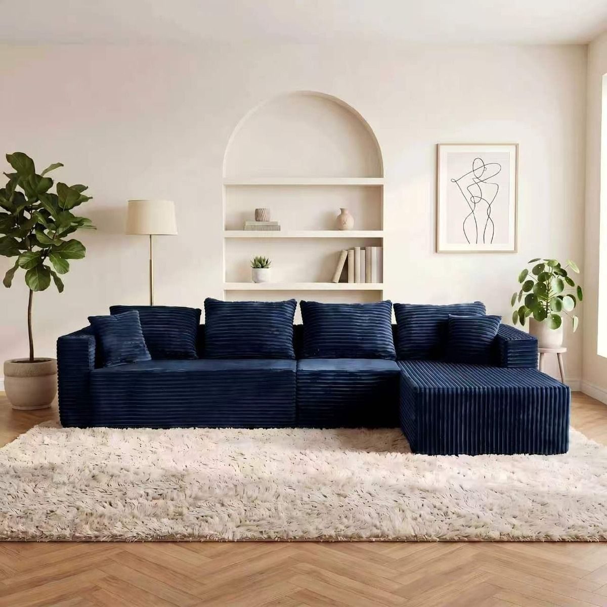 Navy Ultione The L compressed chaise sofa shown at its recovered size