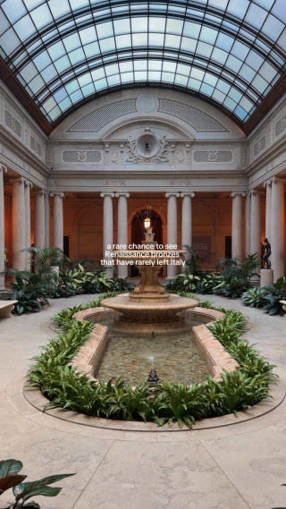 The Frick garden court, with a fountain beneath a glazed ceiling.