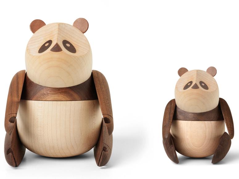 Two wooden pandas—one small, one large.