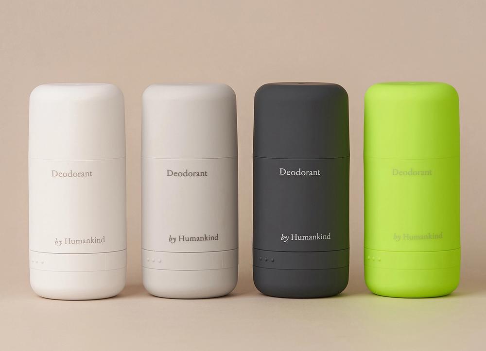 A lineup of four Humankind deodorants in multicolored applicators.