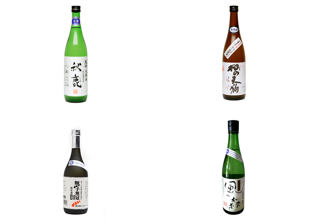 Four sake bottles on a white background.