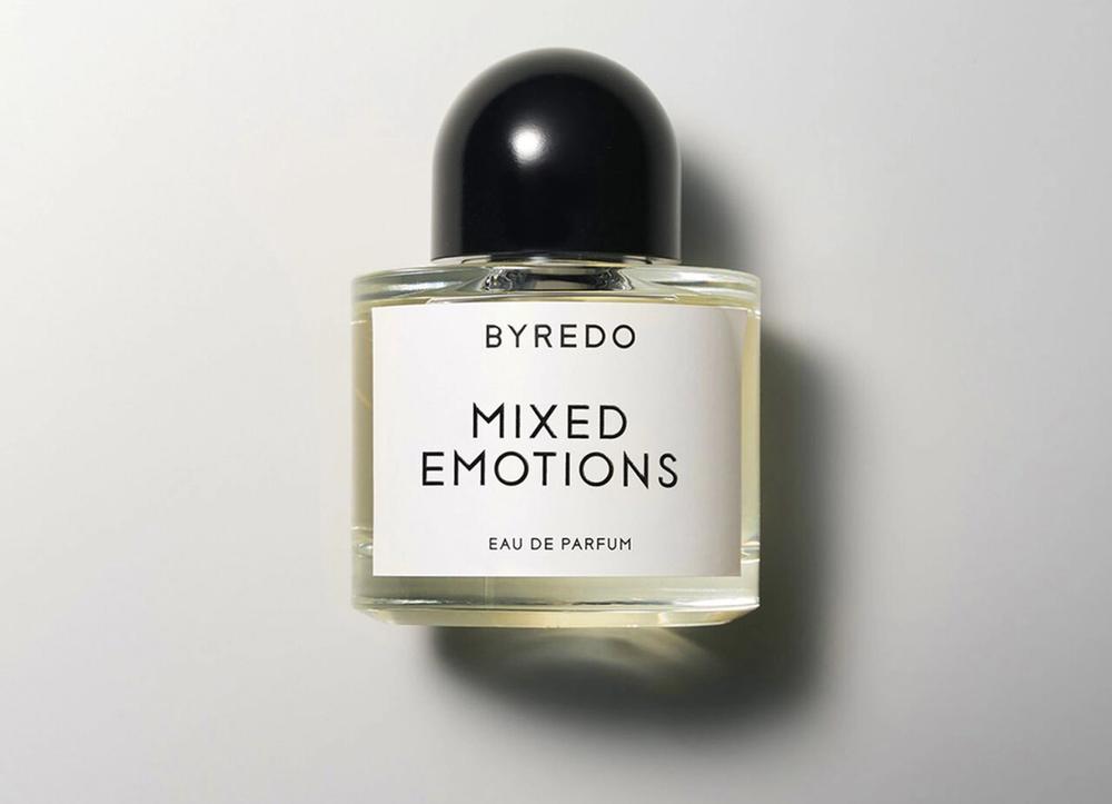 A bottle of Byredo Mixed Emotions perfume on a white background.