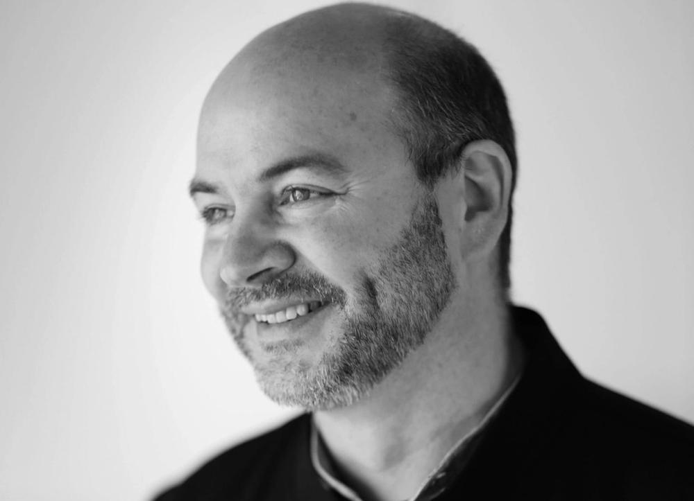 Black and white photo of Snøhetta co-founder Craig Dykers 