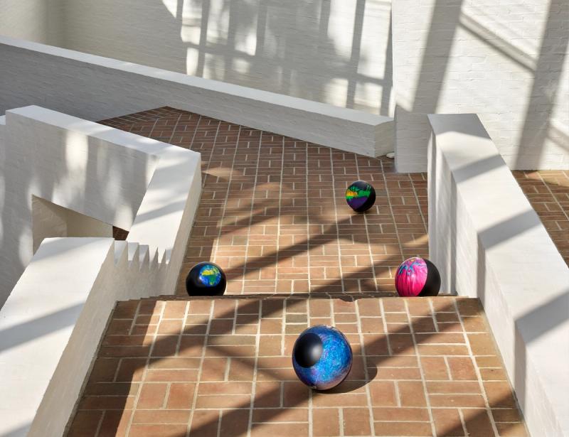 Stadler’s playful bowling-ball installation in the Glass House’s Sculpture Gallery. (Photo: Michael Biondo)
