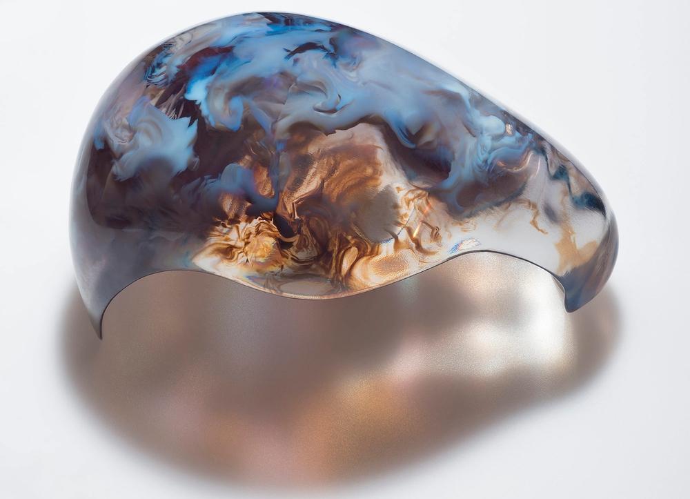 A blue, brown, and translucent sculpture by Neri Oxman.