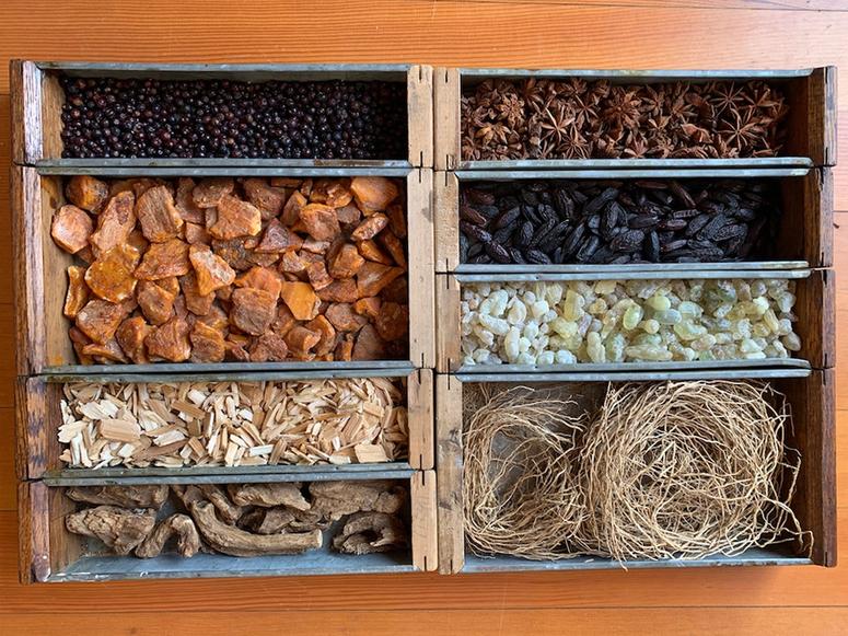 Various scented objects archived in trays.