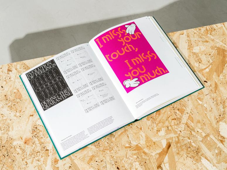 The book “Designers Against Coronavirus” open on a wood table