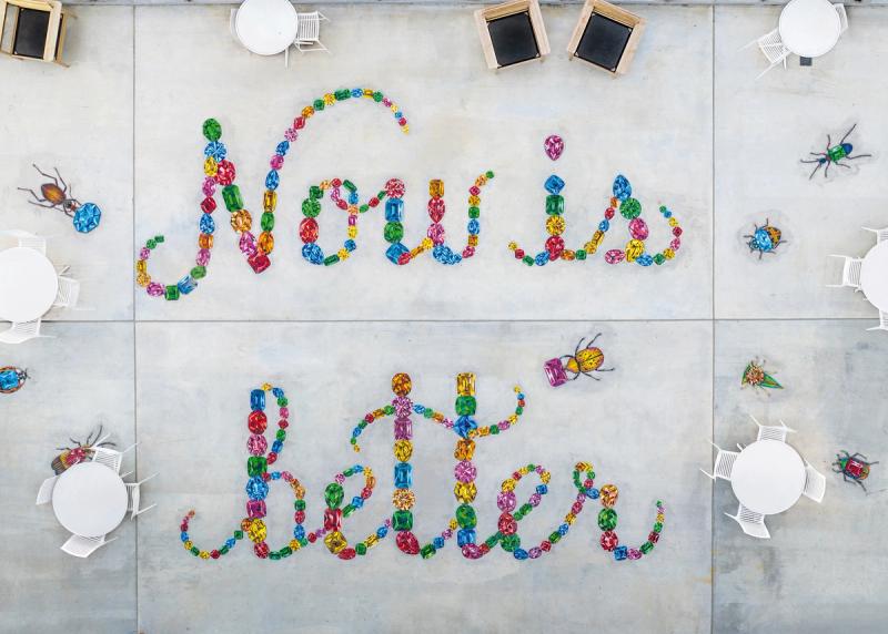 A “Now Is Better” mosaic on the top floor of the Ledger office building in Bentonville, Arkansas. (© The Ledger, Bentonville, AR)