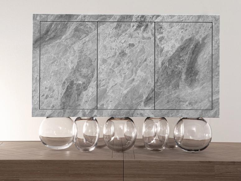 A glass and stone Mathieu Lehanneur sculpture.