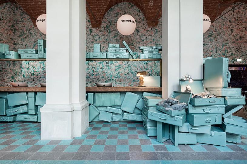 The reception desk at the 25Hours Hotel in Florence, designed by Navone and OTTO Studio. (Photo: Dario Garofalo)